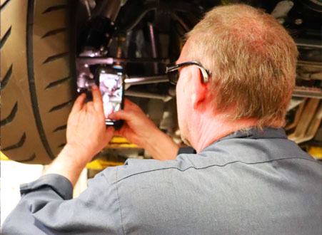 Man At Work on Vehicle | Dale Adams Automotive Specialists